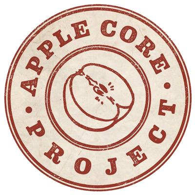 Circular logo for the Apple Core Project with a sliced apple illustration in the center and the text 'Apple Core Project' around the top and bottom edges.