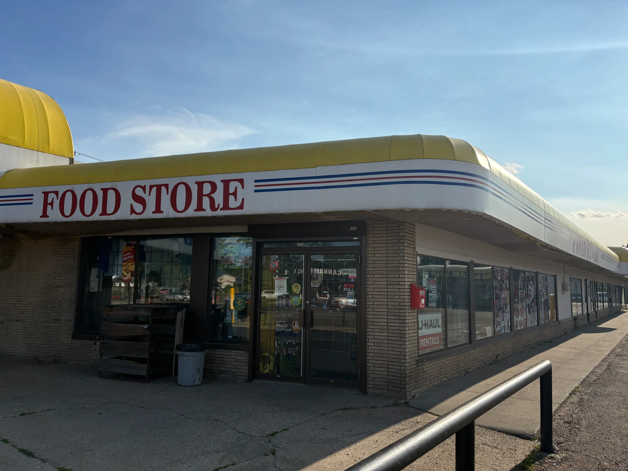 Exterior view of Athlon Food Store showing the storefront and convenient shopping location.
