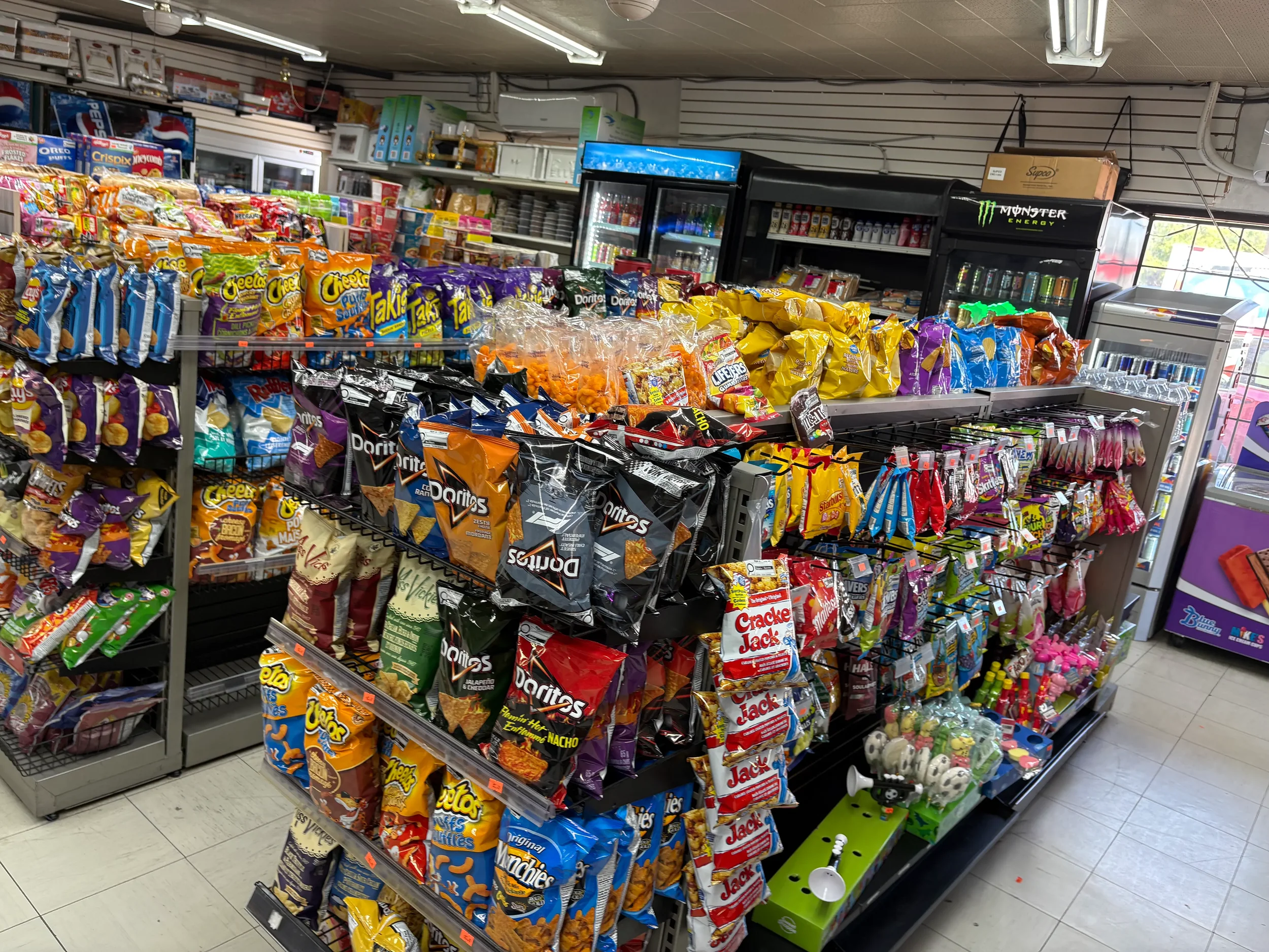 Wide view of Athlon Food Store showcasing groceries, snacks, beverages, and everyday essentials in Edmonton.