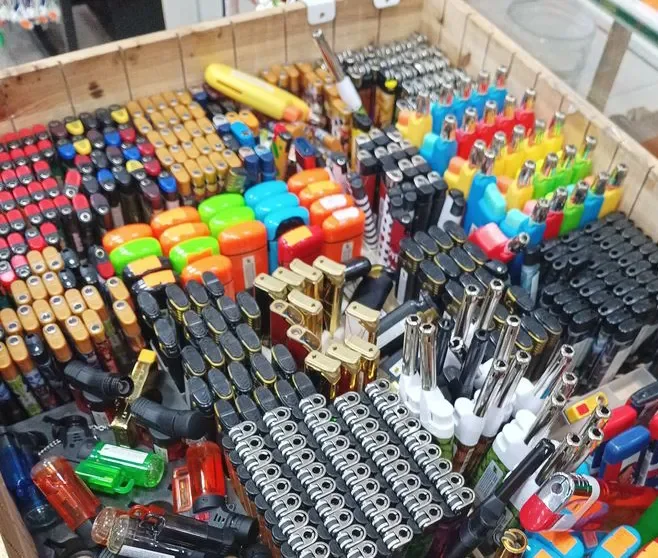 A variety of colorful markers, highlighters, and pens displayed in an organized manner on a store shelf.
