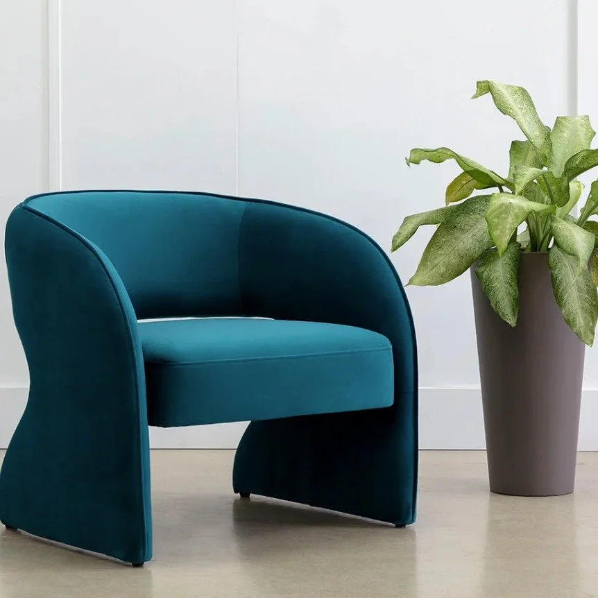 HellLOOO Rosalia. Curves are everywhere now and it's time to give them a chance! Nothing brings your interior up to date like well-crafted curves. And the colours, we LOVE the teal in this lounge chair by Sunpan.