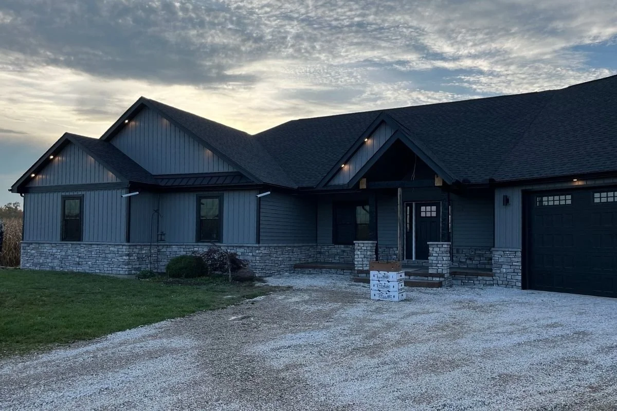 Stone Exterior Home at Dusk in Homes county Ohio