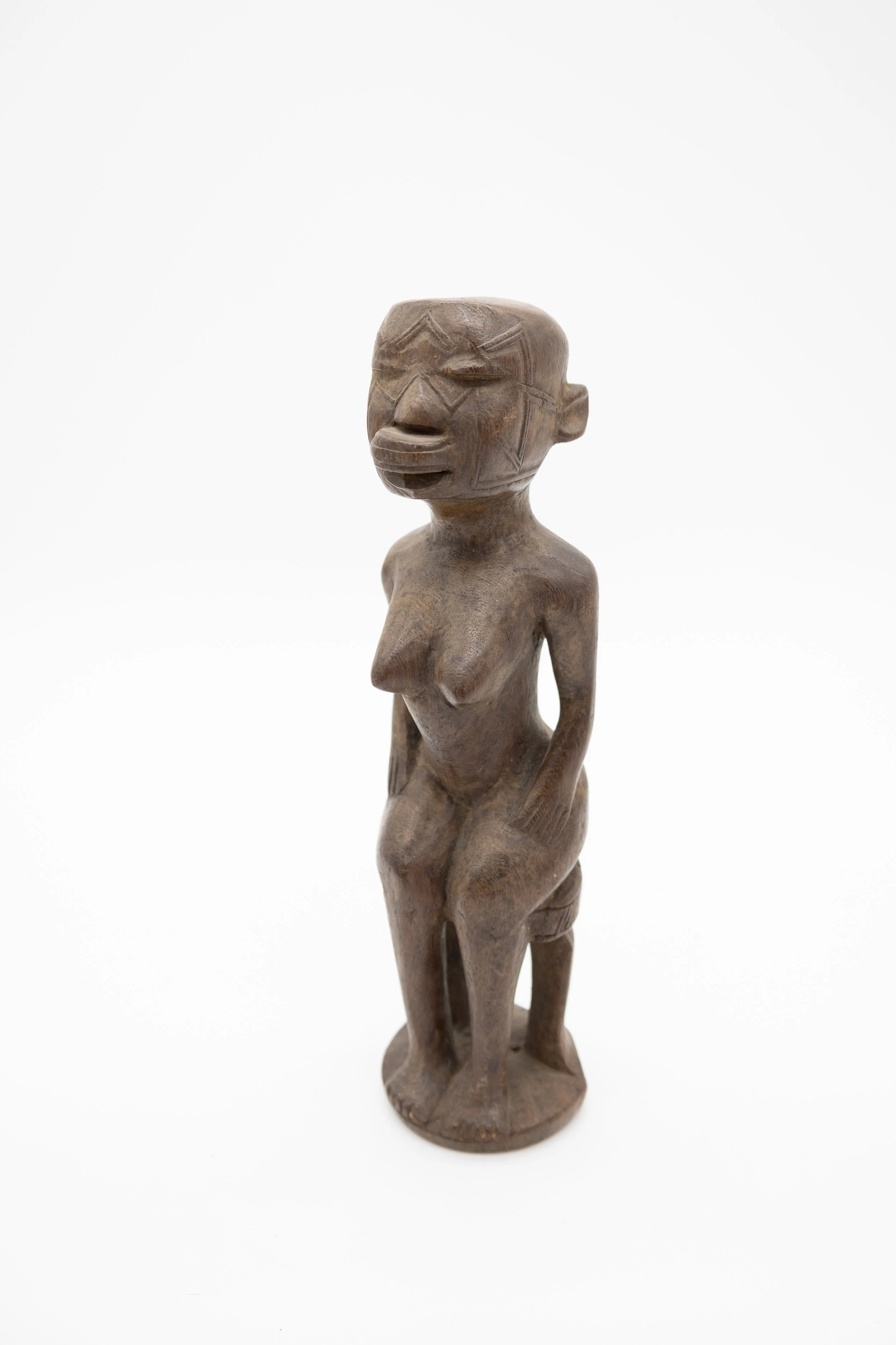 West African Carved Female Seated Figure