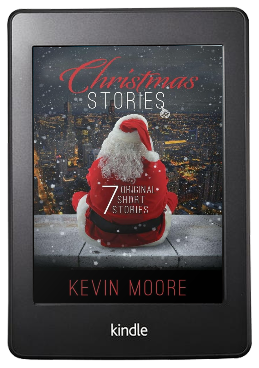 Kindle e-reader displaying a book cover for 'Christmas Stories' by Kevin Moore, featuring a person dressed as Santa Claus sitting on a ledge overlooking a city skyline at night with snow falling.