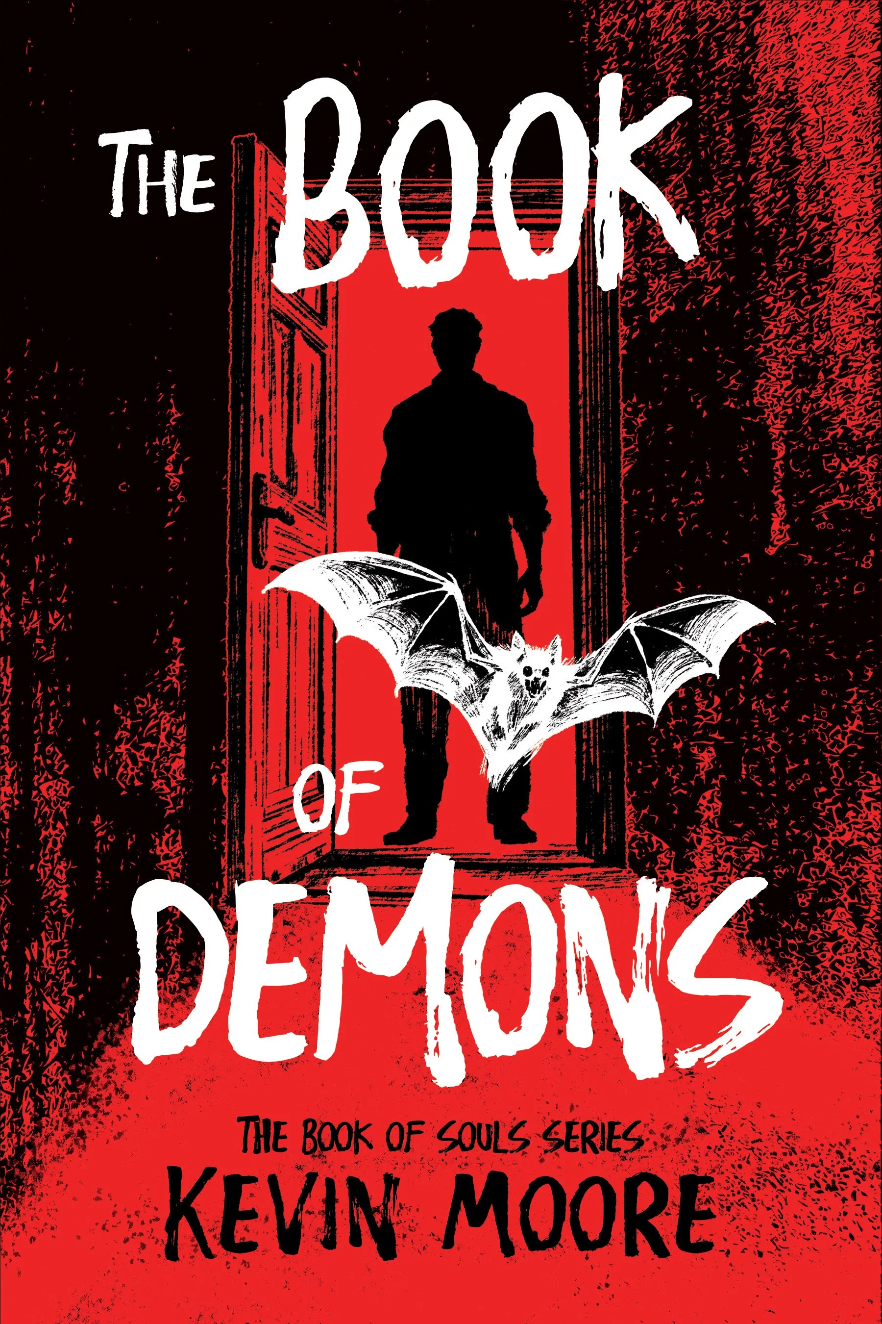 The cover of a book titled 'The Book of Souls Series: Demons' by Kevin Moore. It features a silhouette of a person standing in a doorway with red and black colors, and a bat with open wings at the bottom.