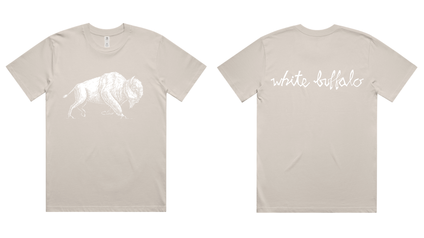 Beige T-shirt with a white line drawing of a buffalo on the front and the words 'white buffalo' written in white script on the back.