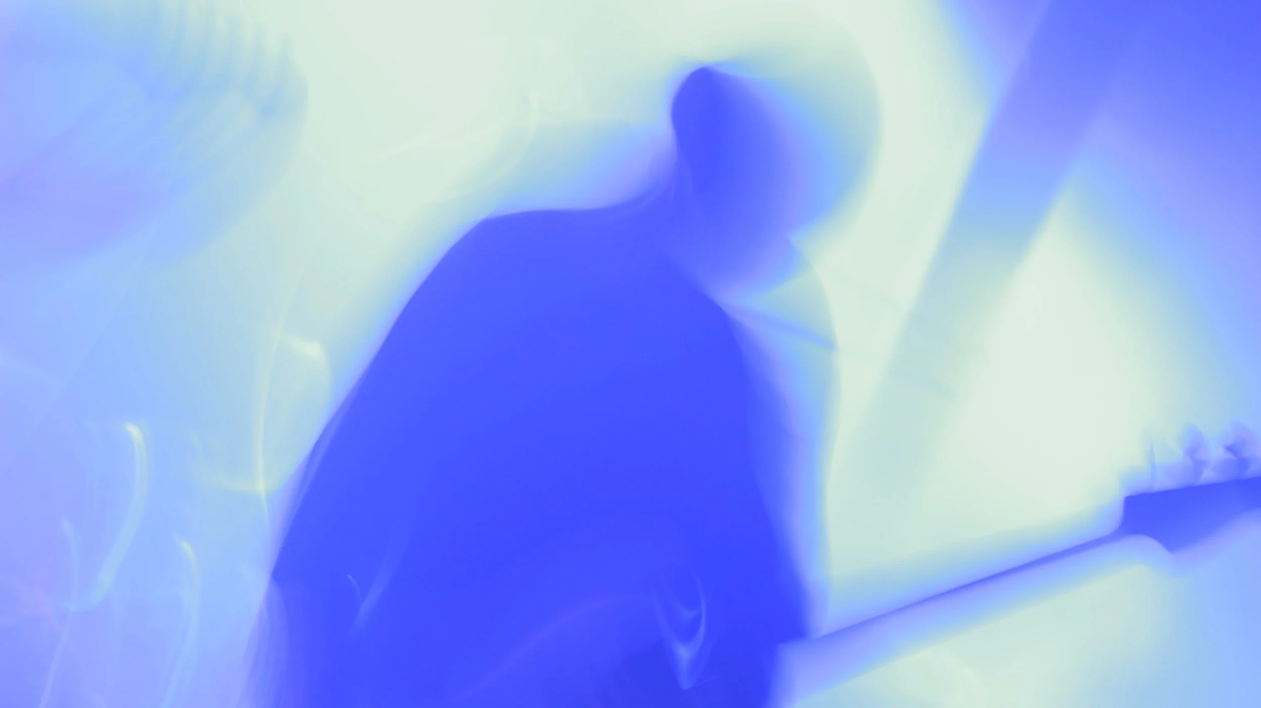 Abstract image with blue and white colors, featuring blurred shapes and light effects, resembling an artistic or digital creation.