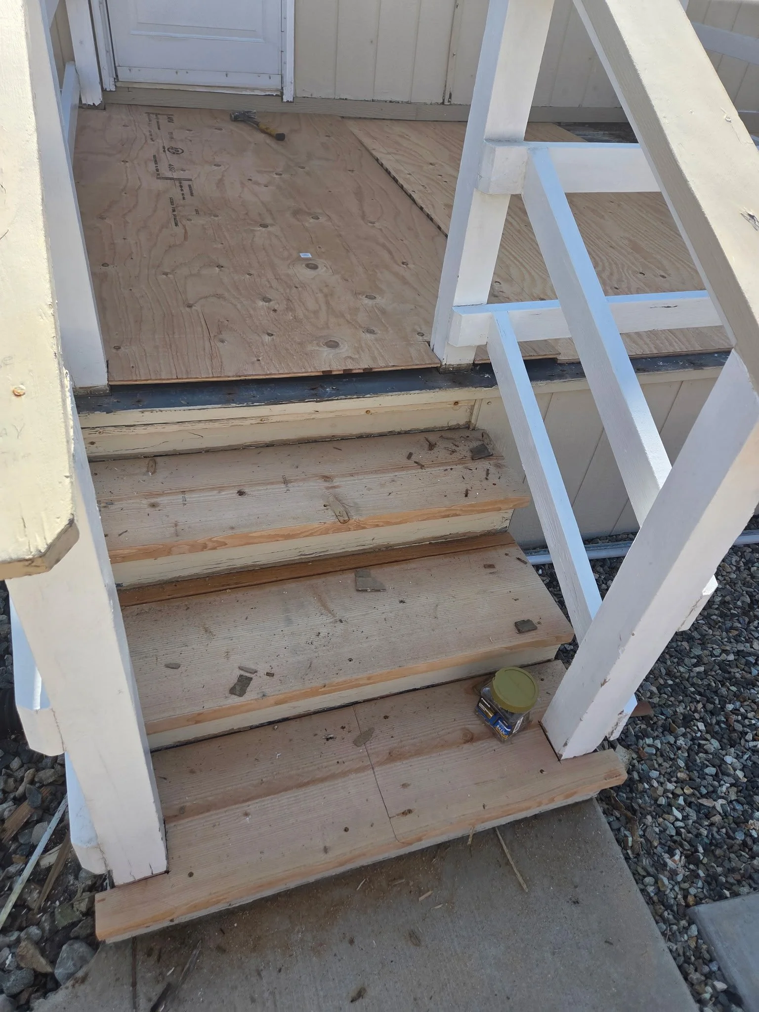 Porch stair and damaged subfloor repair in progress