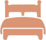 A simple illustration of a brown bed with a headboard and pillows.