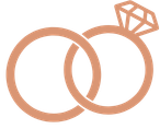 Two intertwined gold wedding rings with a diamond on one ring