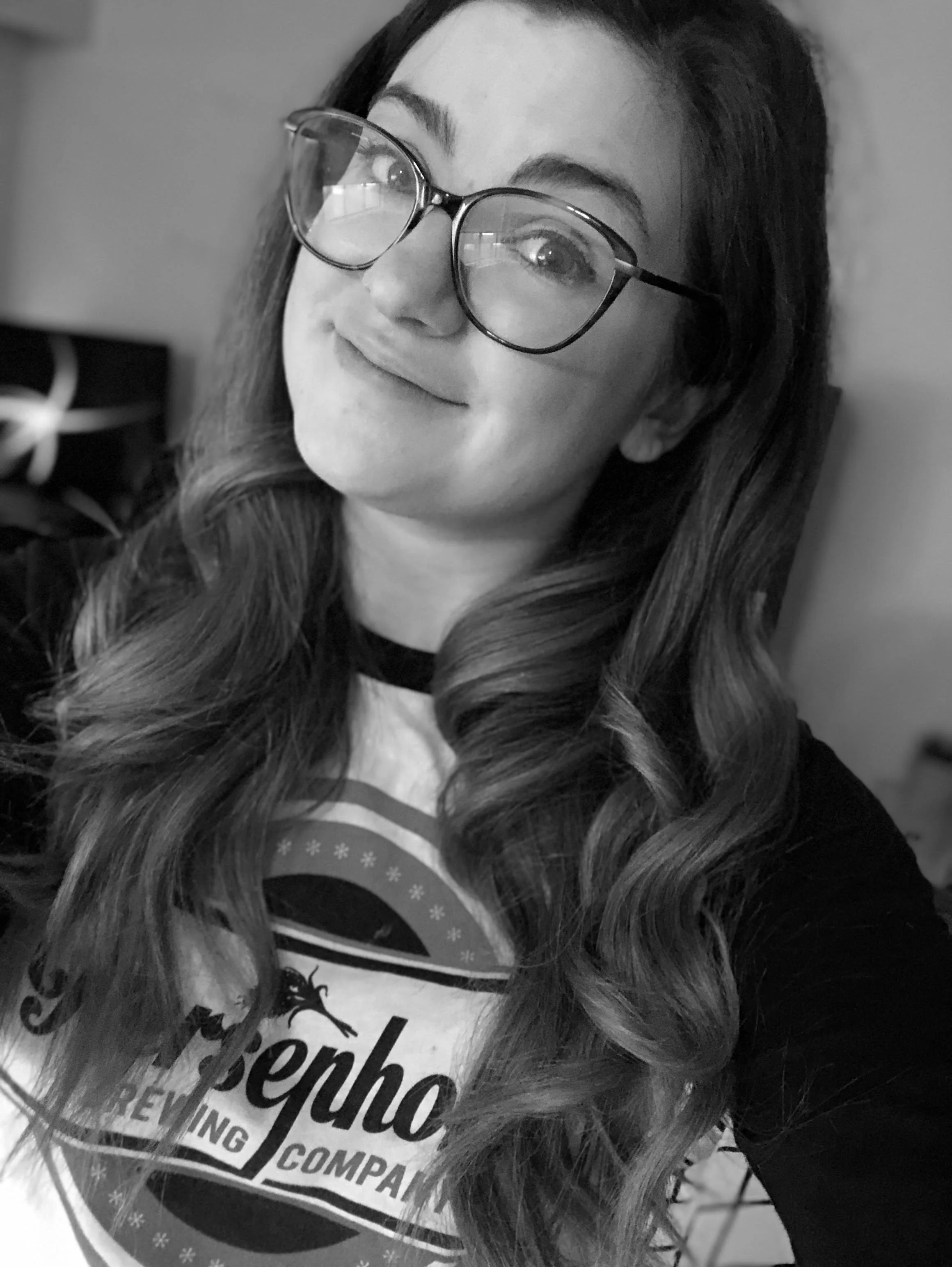 A young woman with glasses