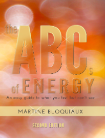 Cover of the book titled 'The ABCs of Energy' by Martine Bloquiaux, second edition, with a background of warm, glowing lights or sun.