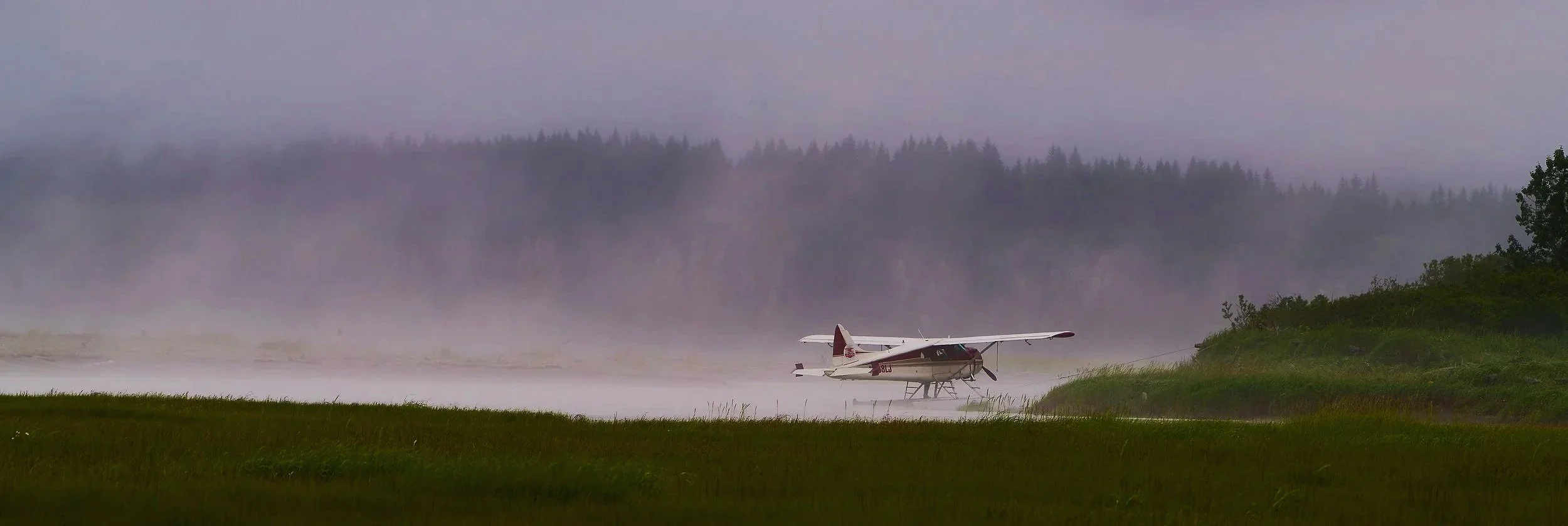 Bush plane parked on water
