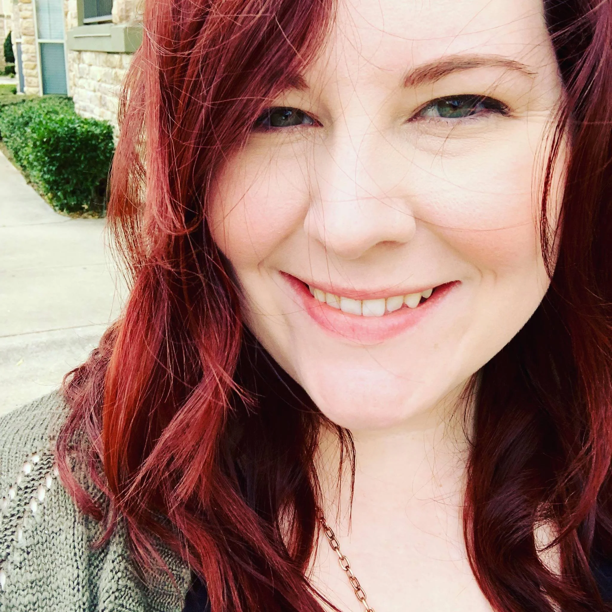 woman outside with red hair