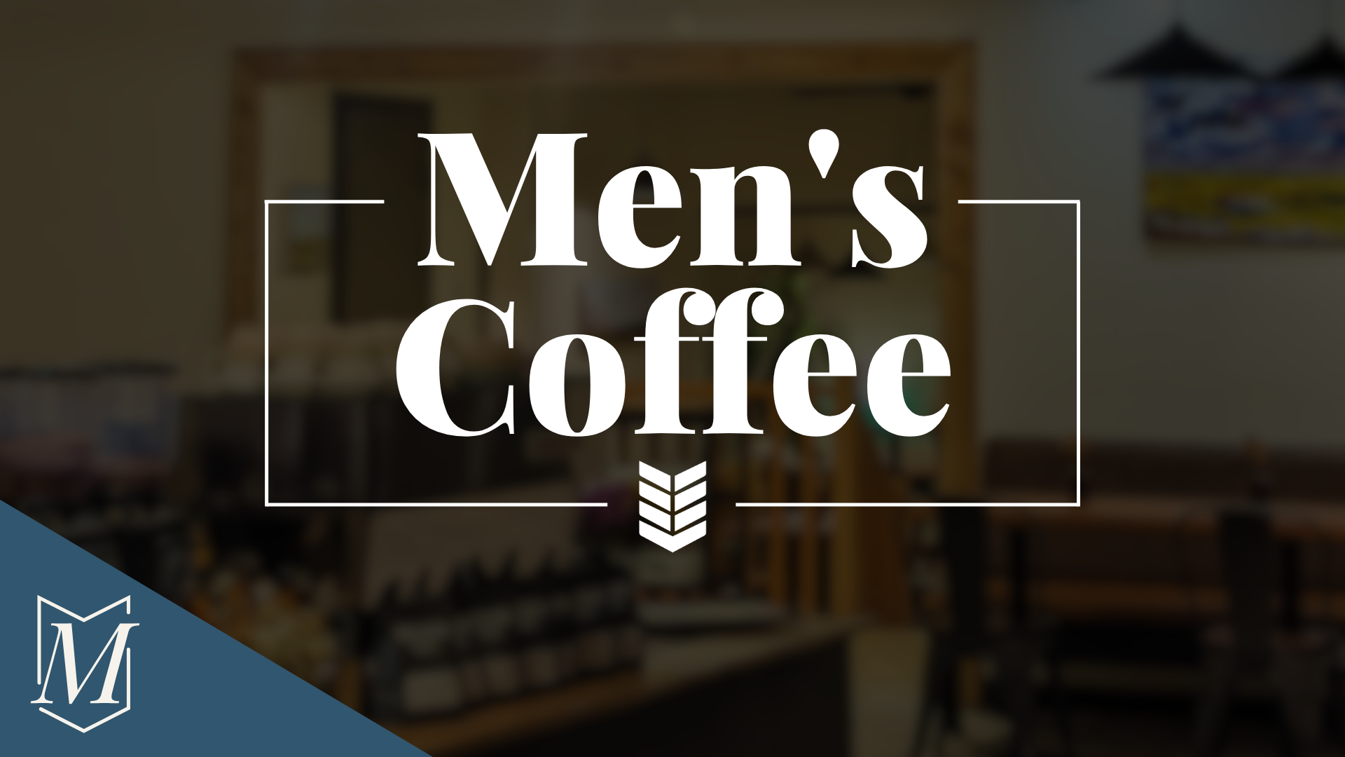 Sign with the words 'Men's Coffee' in white text on a dark background, likely inside a coffee shop.