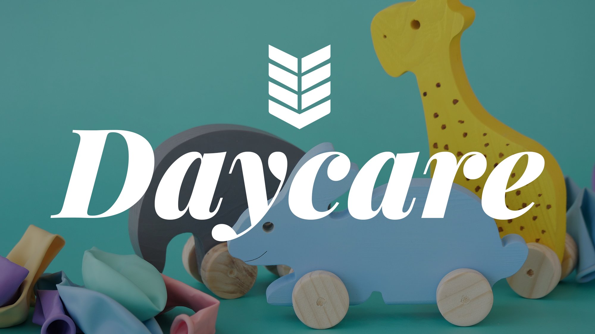 Colorful wooden toys and animal figurines with the word 'Daycare' written across the center.