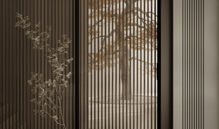 View through vertical wooden slats showing a tree with autumn leaves outside.