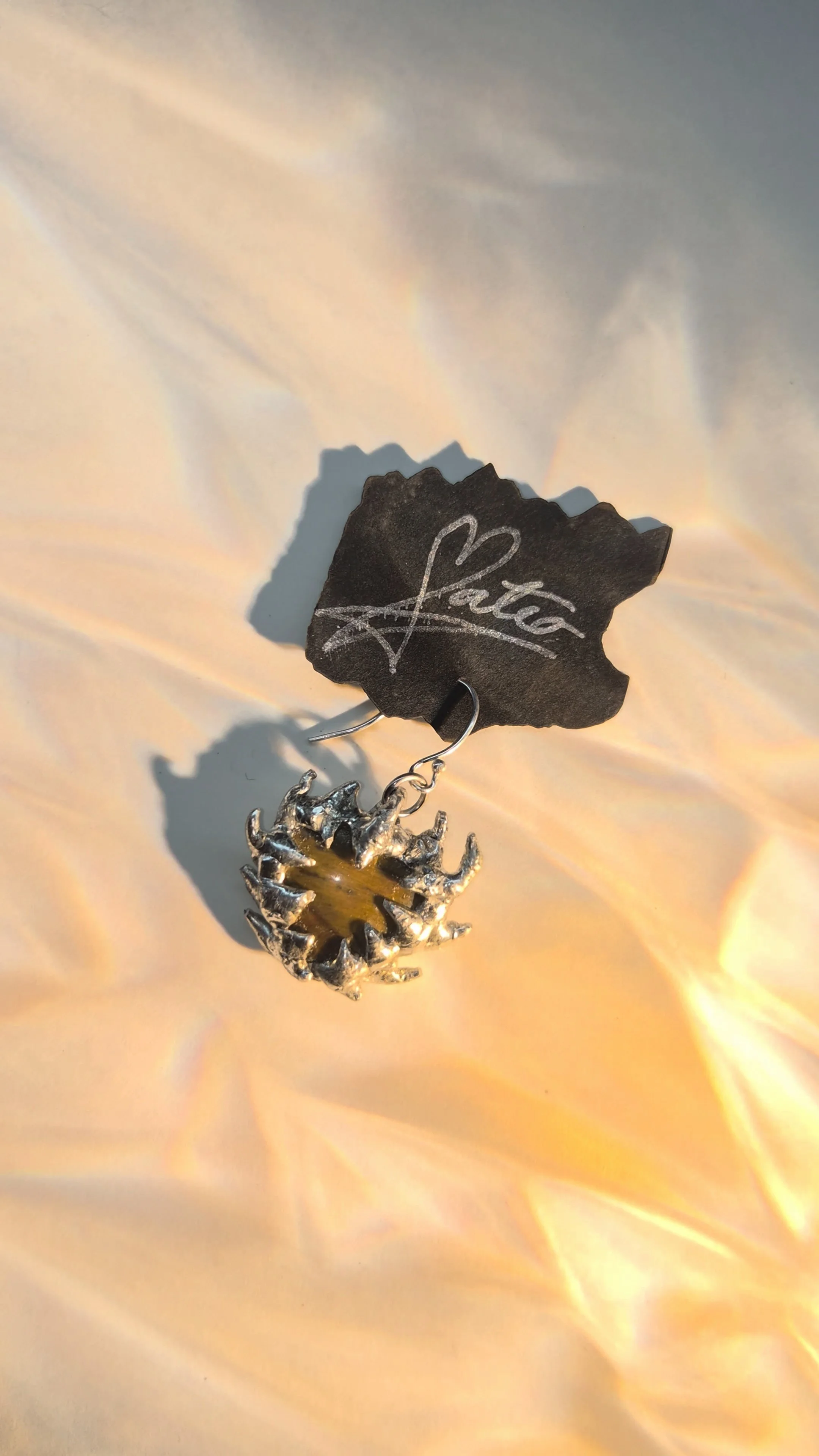 sacred heart earring.jpg