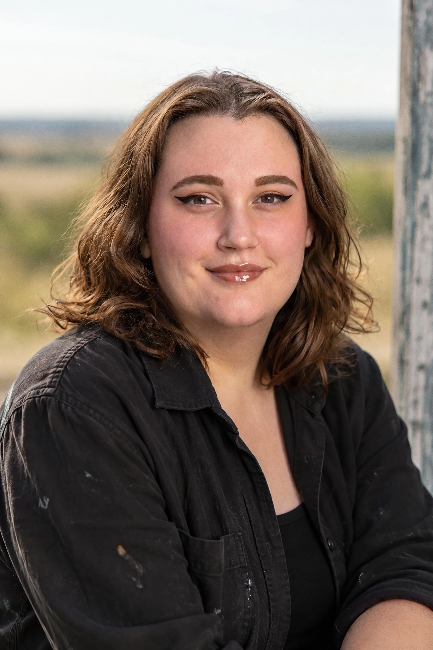A professional headshot of Paige Prekker, a North Dakota Landscape Artist.