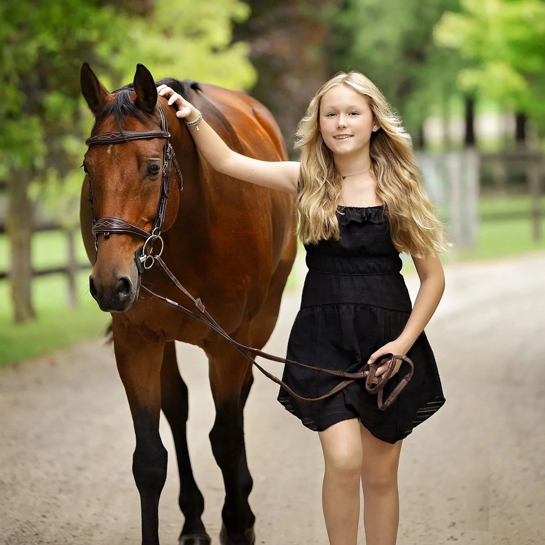Southern Ontario stable portrait of daughter with her horse — Warm, rustic image highlighting textures of the stable and gentle connection.