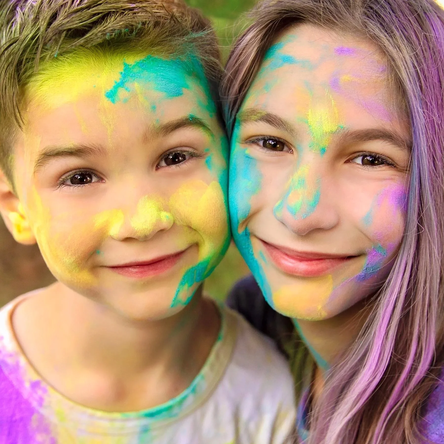 Custom powder paint portrait session in Waterloo — Bold, artistic image featuring dynamic powder colour and lively summer energy.
