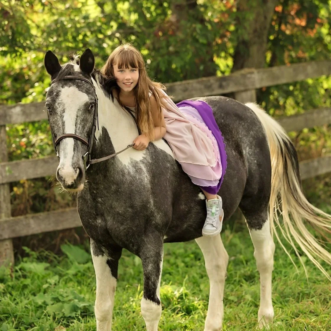 Southern Ontario horse‑and‑rider portrait of daughter — Clean, modern portrait featuring a girl seated confidently on her horse.