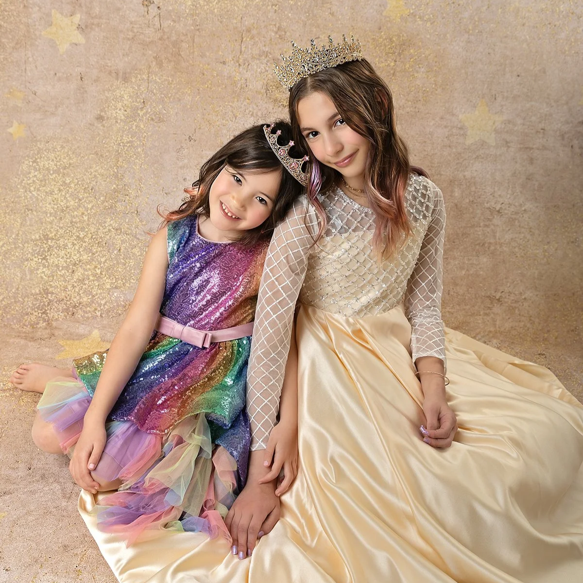 Princess session of two girls in Waterloo Region studio — Soft, whimsical portrait featuring two girls dressed in princess‑inspired outfits.