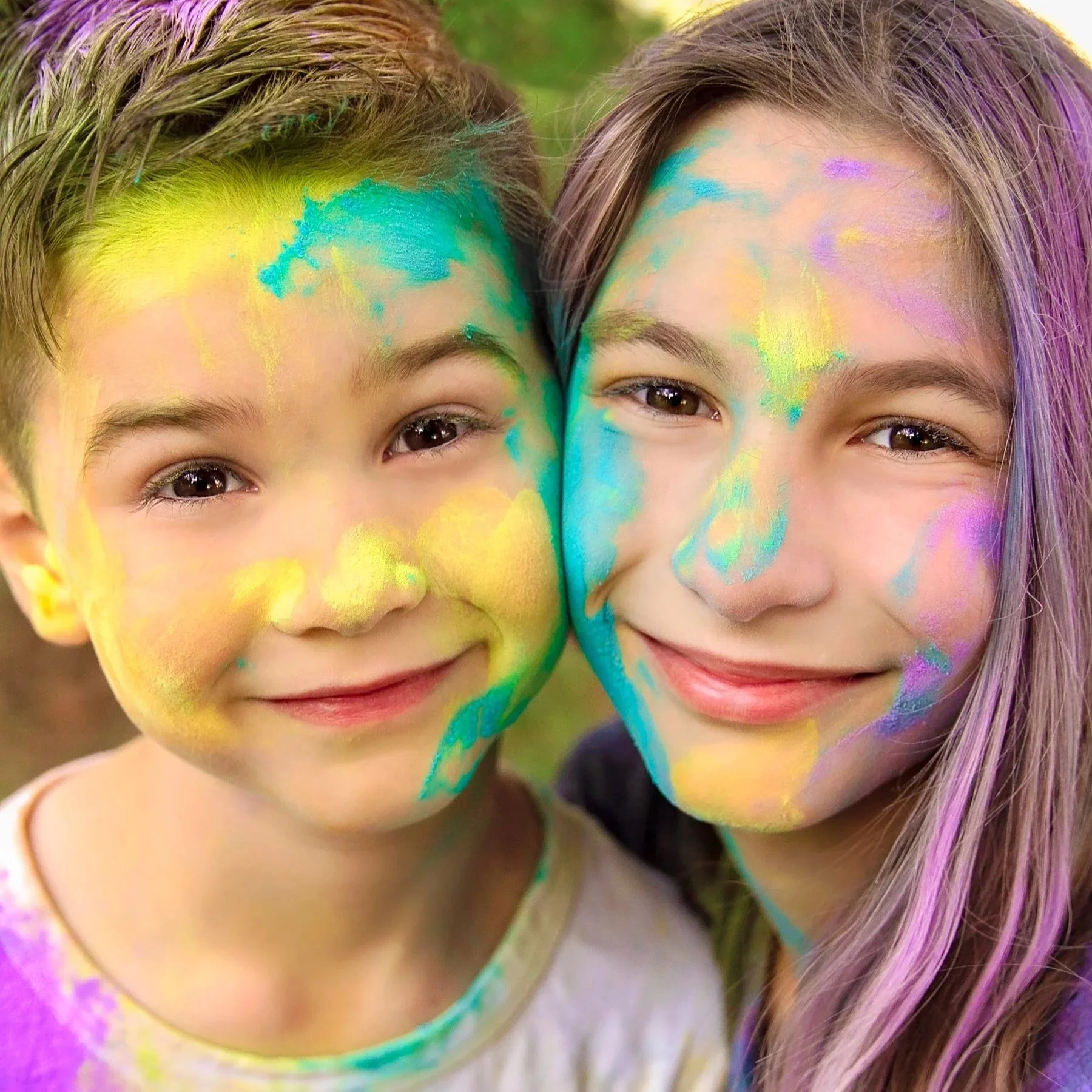 Powder paint photography session with bright colour bursts captured by Janelle Joy Studios