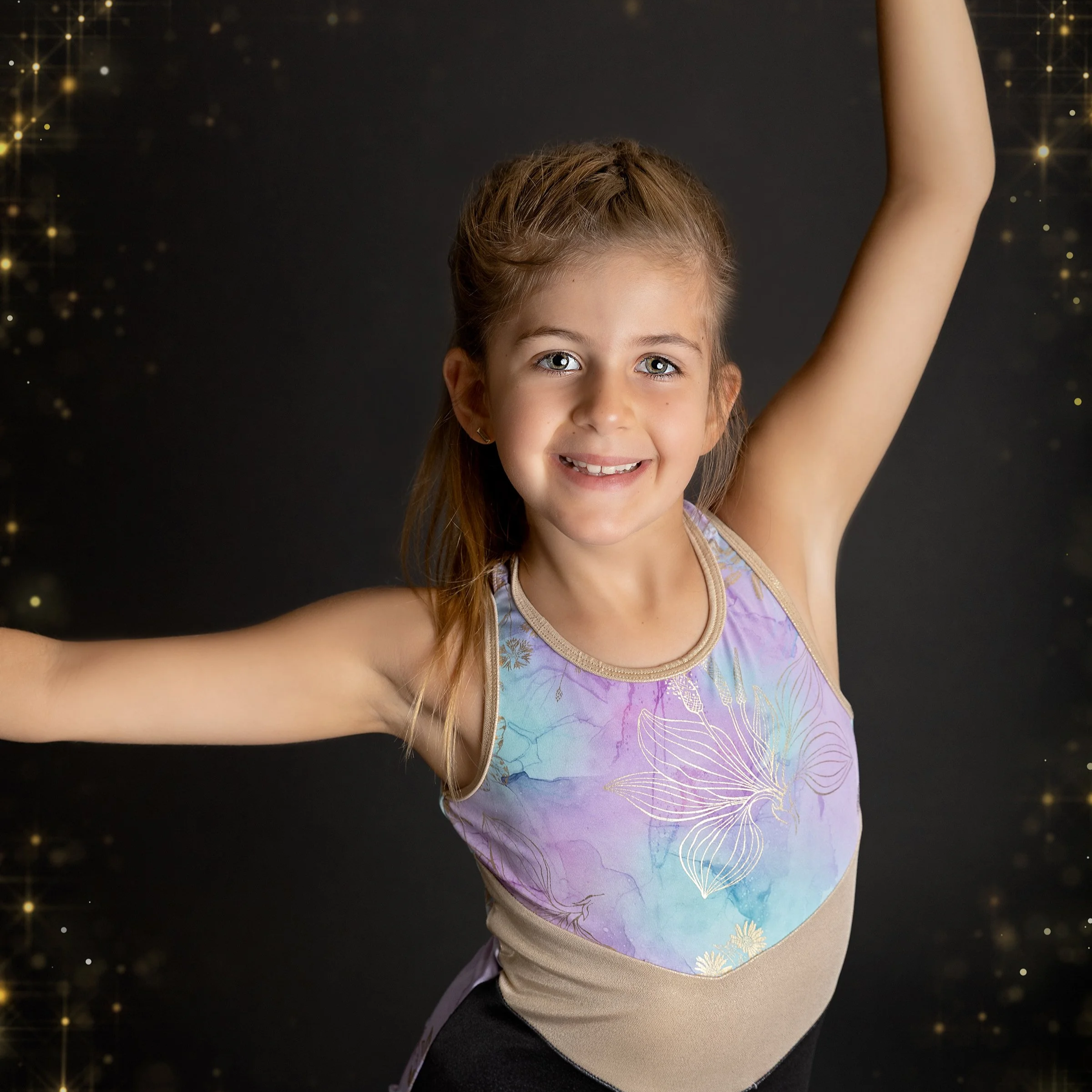 Waterloo Region gymnastics photo of little girl with glimmer highlights — Bright, modern setup capturing movement and subtle sparkle.