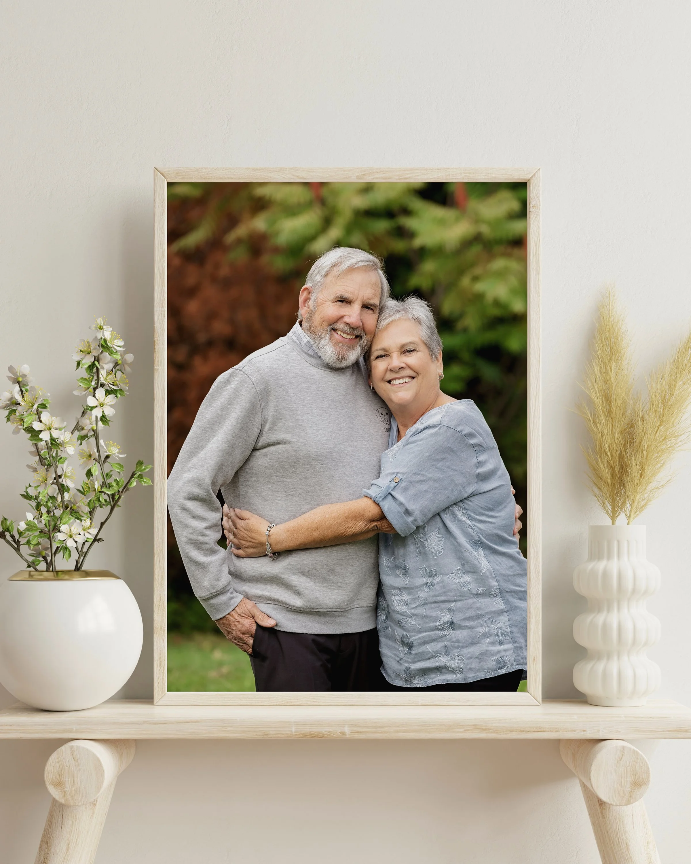 Older couple sharing a warm moment during a portrait session in Kitchener-Waterloo
