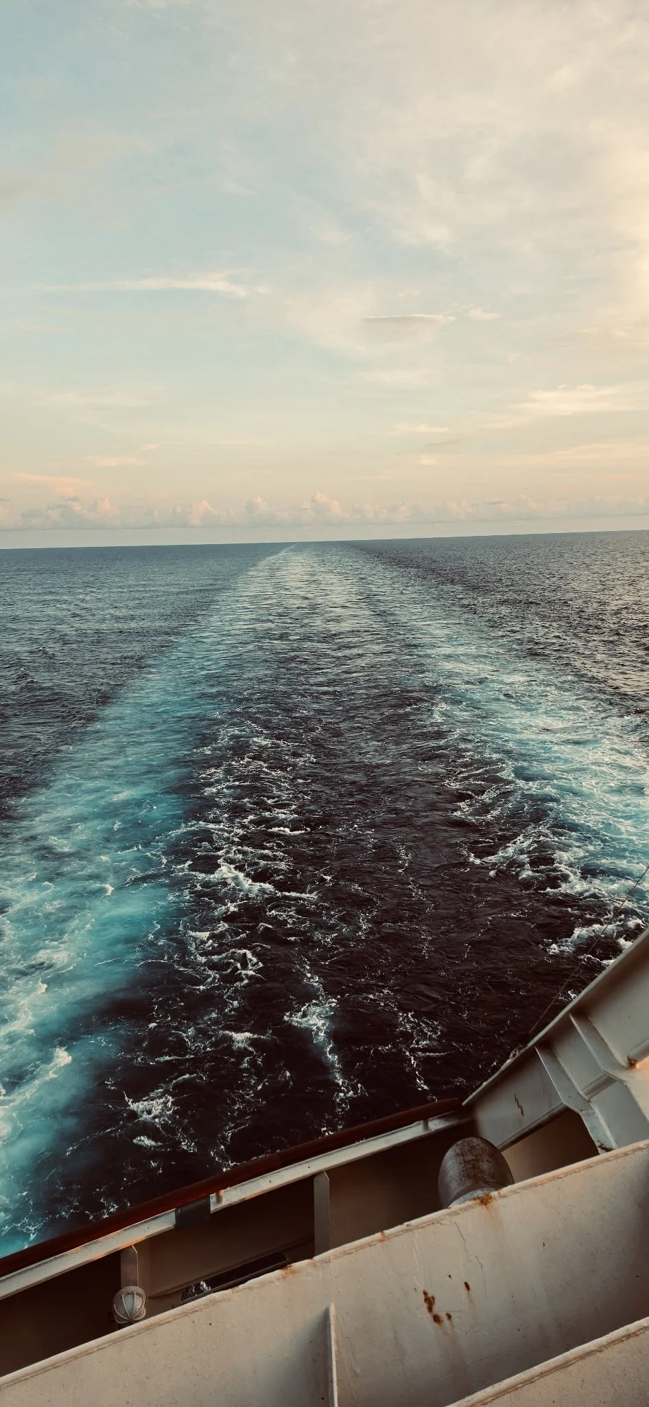 Ocean wake view from a ship representing moving forward and navigating life's major transitions smoothly.