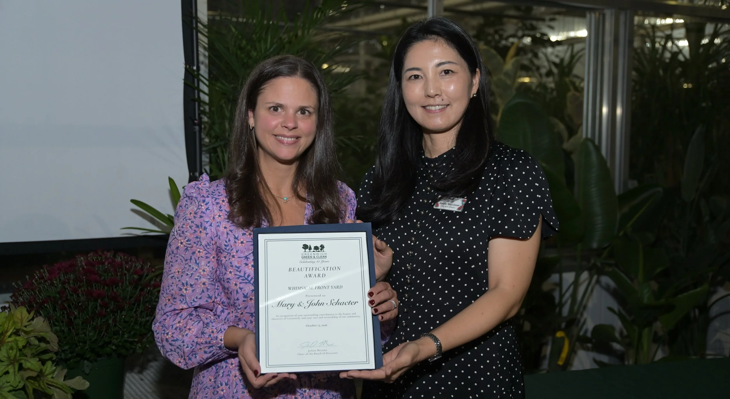 🕊️ Certificate of Merit: Whimsical Front Yard | Mary &amp; John Schacter

(📸 Mary and John&rsquo;s daughter, Lisa, accepting the award on their behalf.)

A little whimsy, a welcoming garden, and plenty to make passersby smile.

🌿 In Merritt Acres,