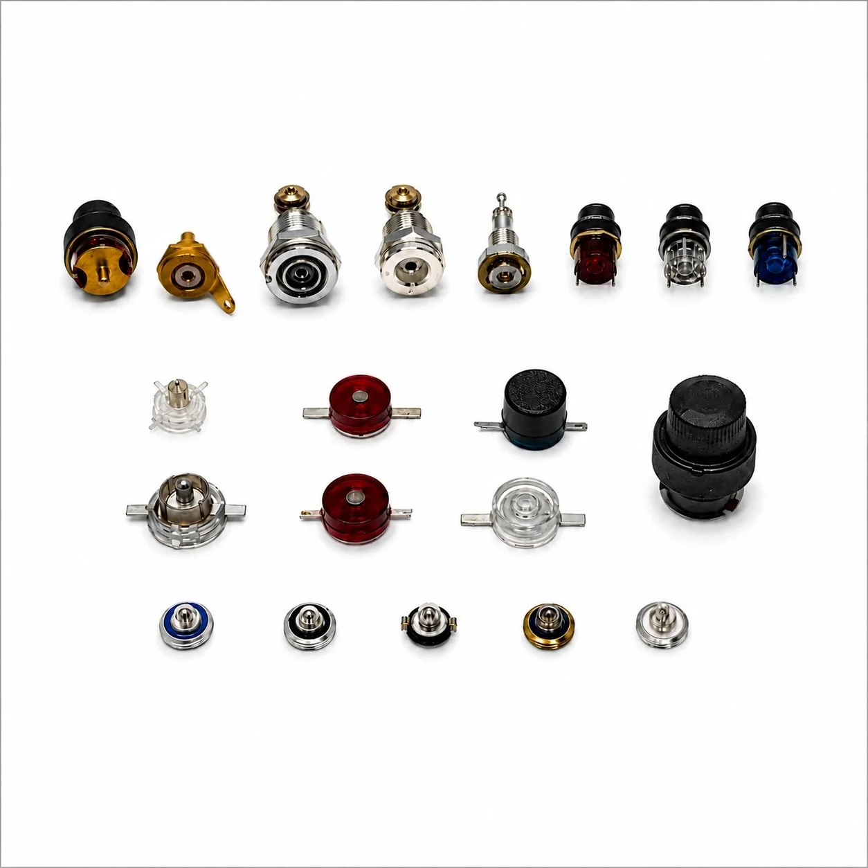 Collection of electrical and electronic components, including connectors, switches, and relays, arranged on a white background.