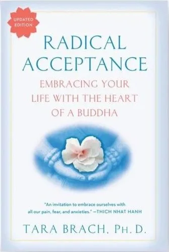 Cover of the book titled 'Radical Acceptance' by Tara Brach, Ph.D., with a white flower floating on water on the cover.