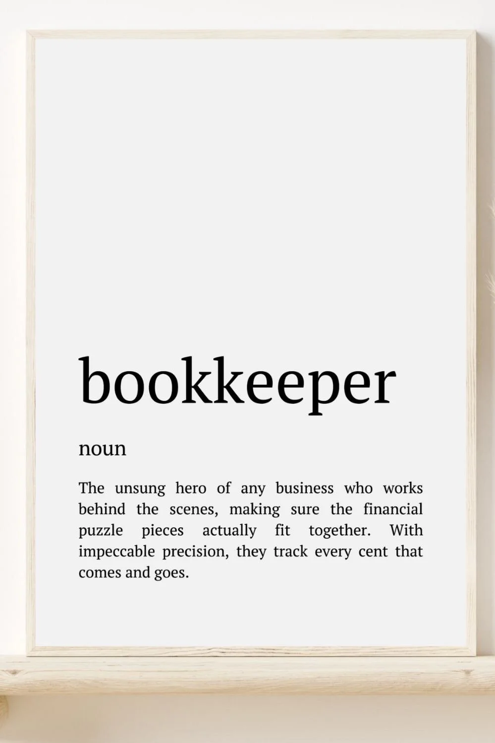 A white board with the word 'bookkeeper' in large black letters, followed by the definition describing a bookkeeper as the unsung hero of business.