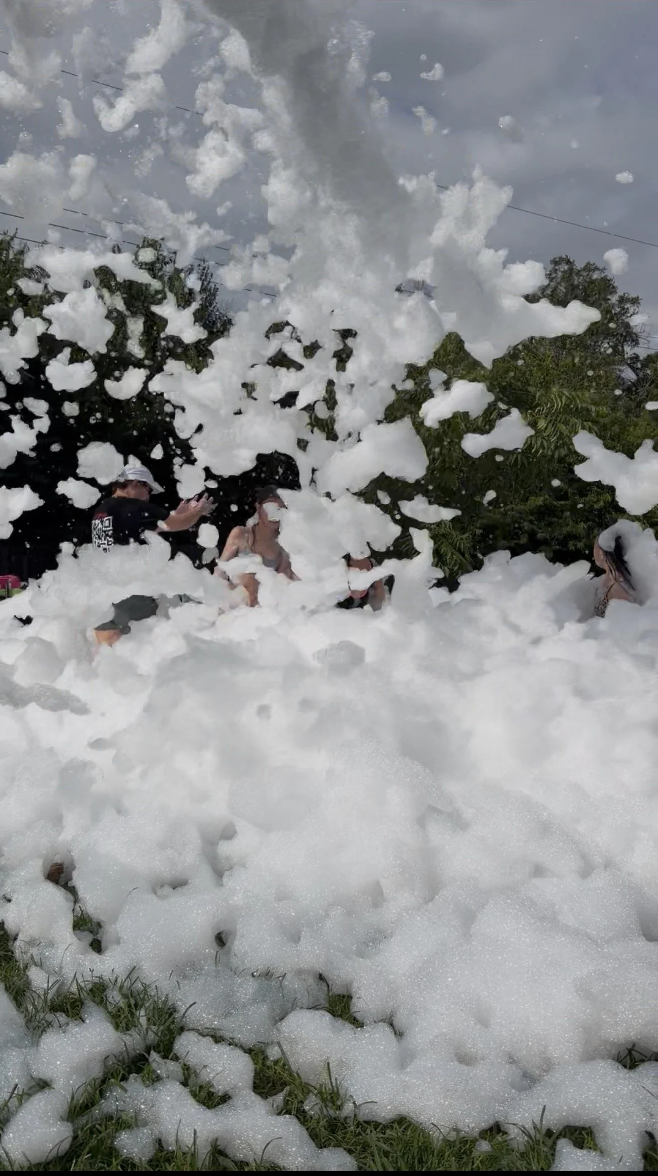 Guests enjoying a Foamageddon DFW foam party