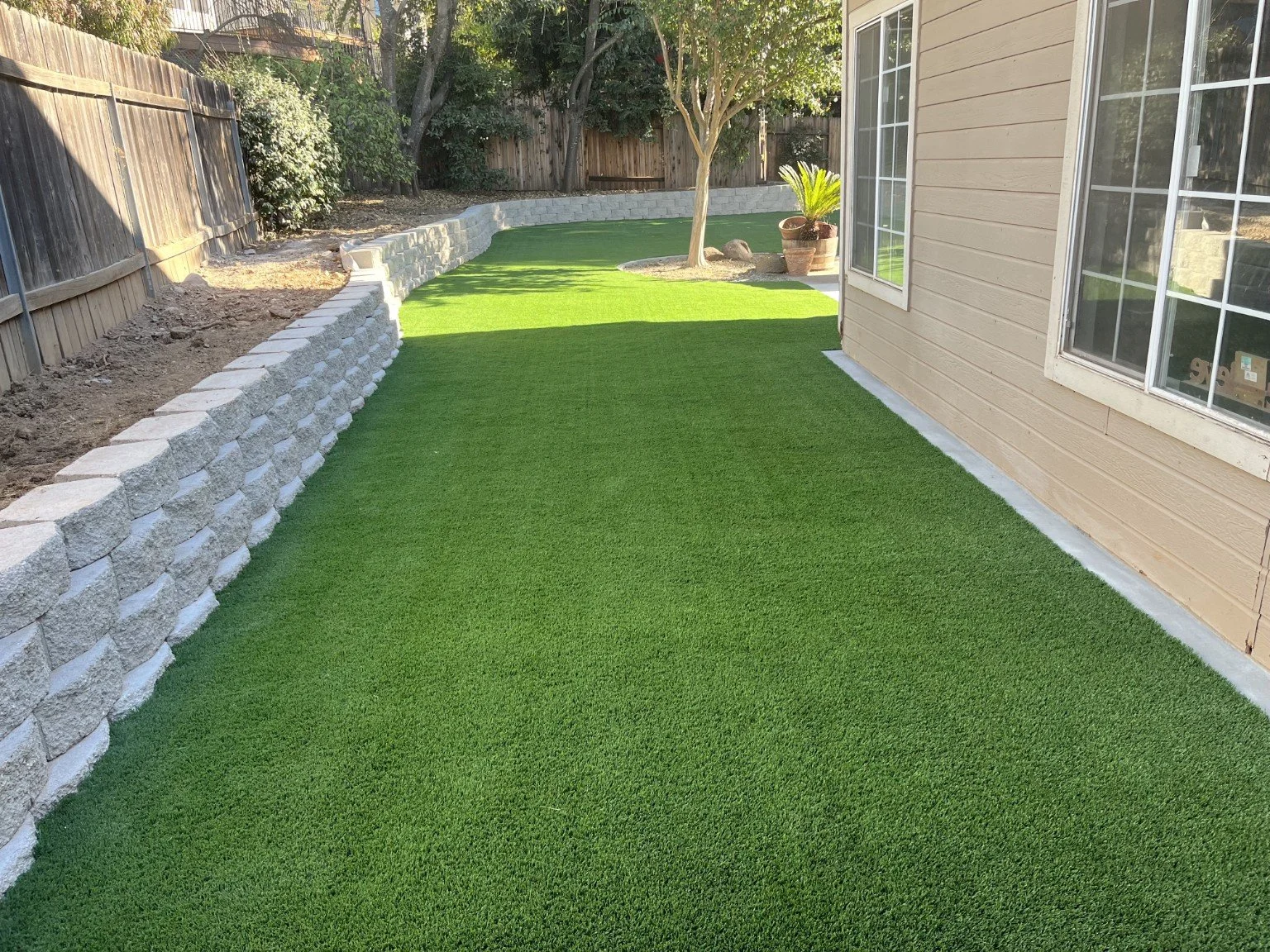 Artificial turf and retaining wall installation in Auburn, CA.