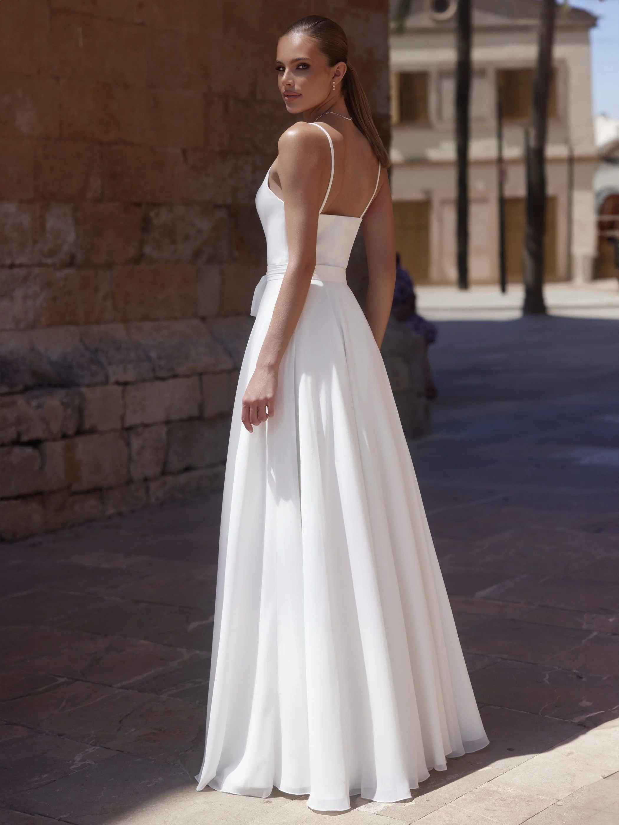 Covex wrap skirt back. Featuring a beautifully crafted wrap silhouette