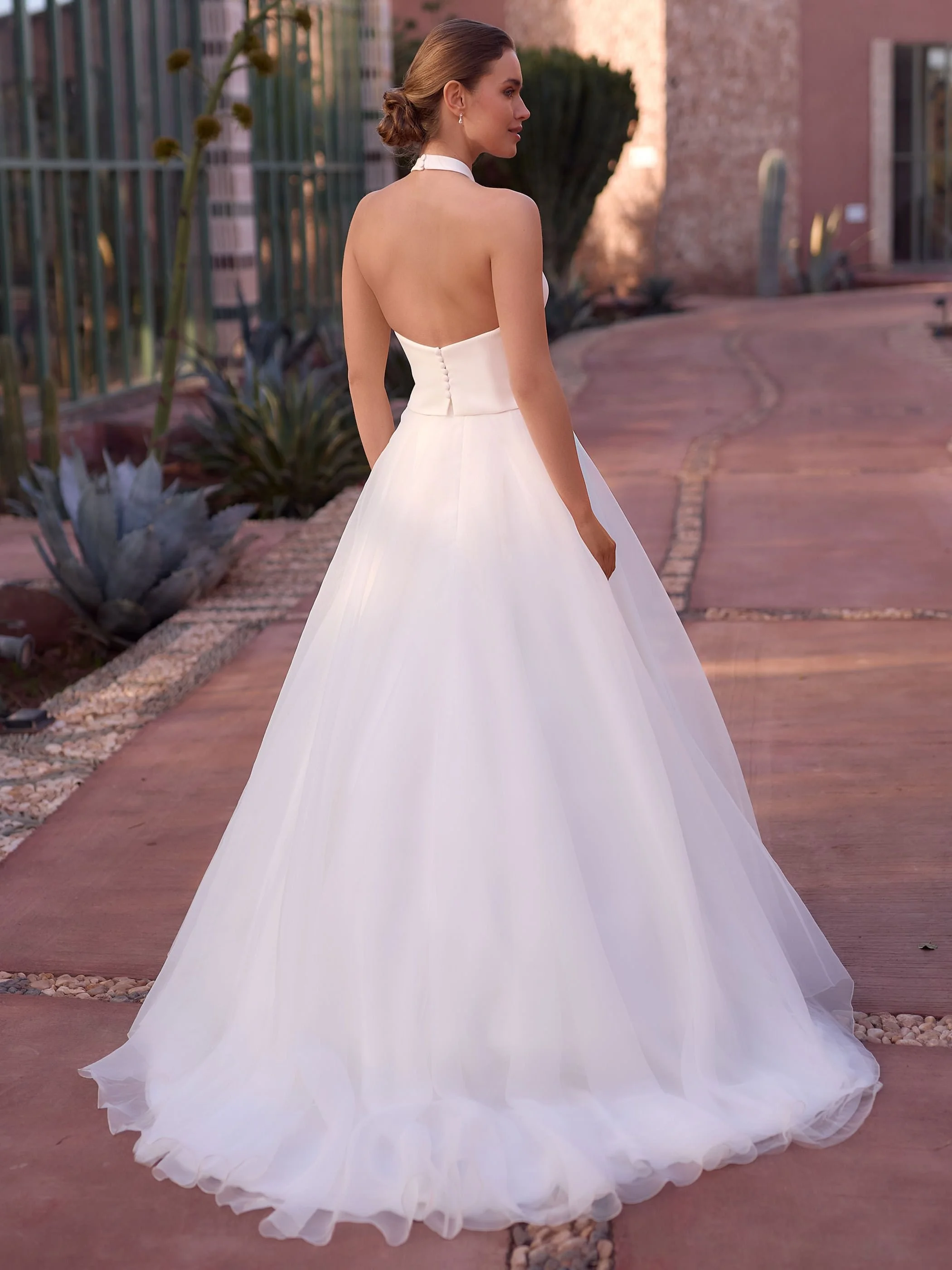 Melody with halter  bridal top rear view.