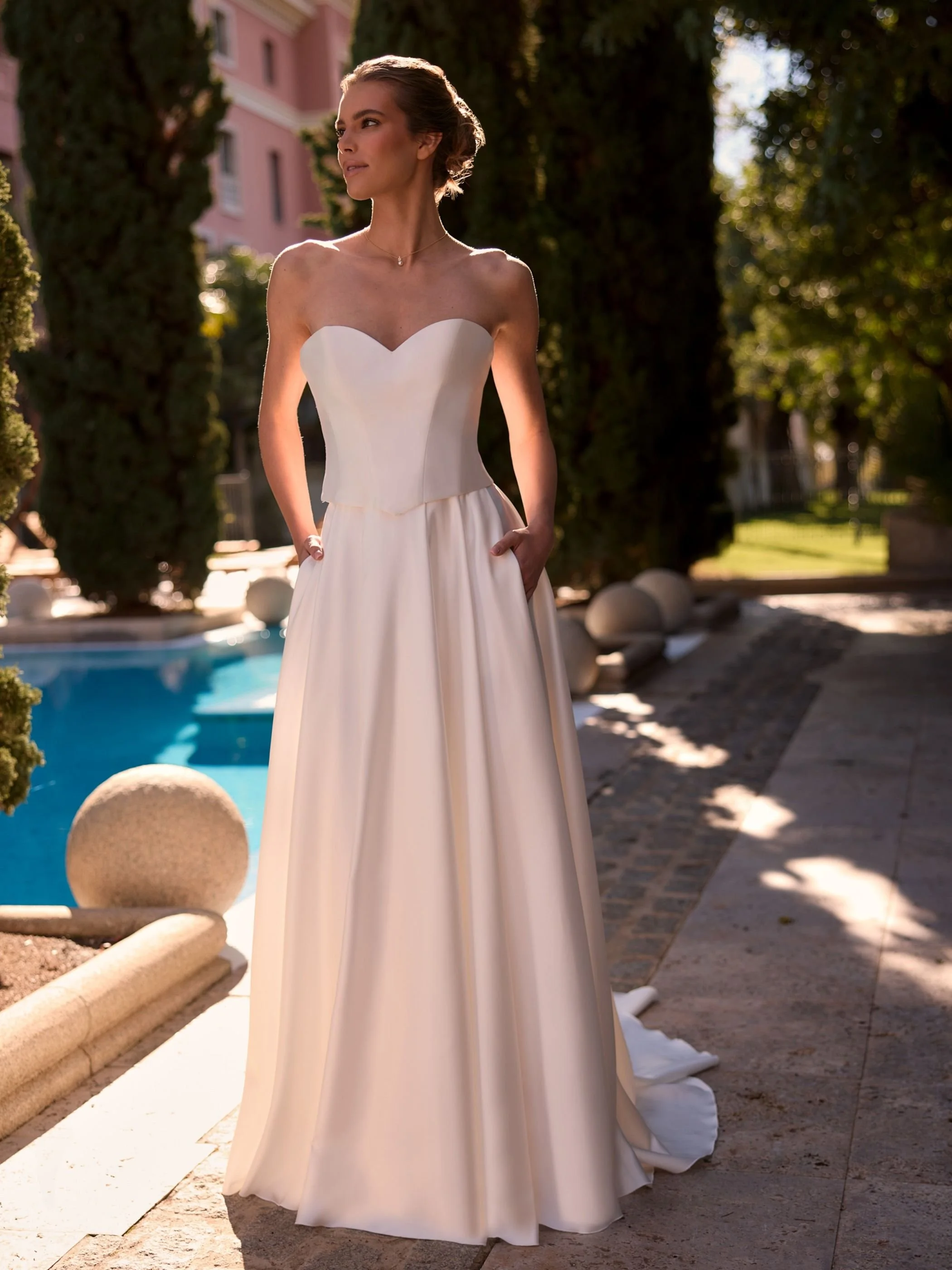 Composed skirt with corset topComposed bridal skirt of lux satin with generous train and box pleats