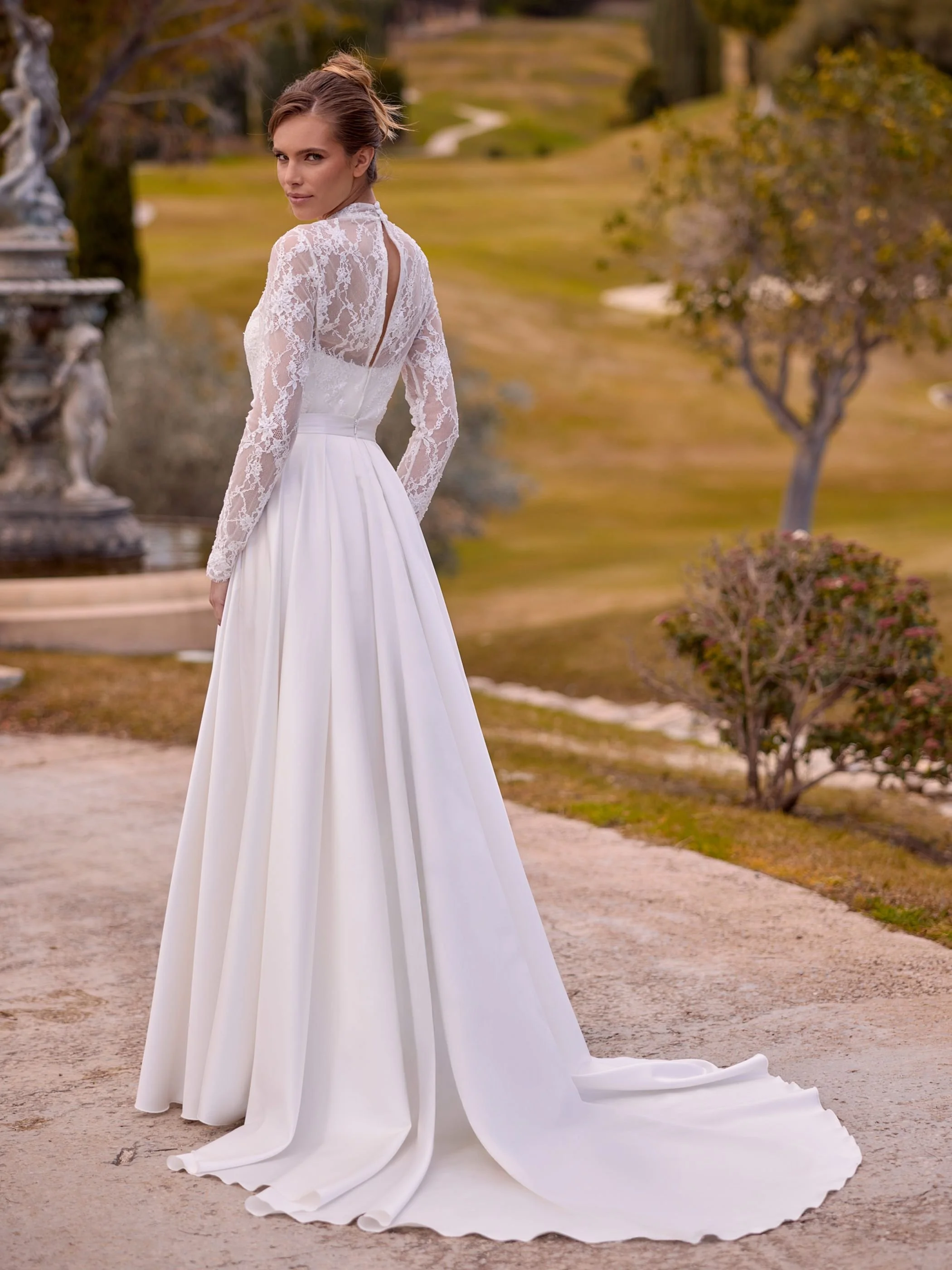 Composed skirt backComposed bridal skirt of lux satin with generous train and box pleats