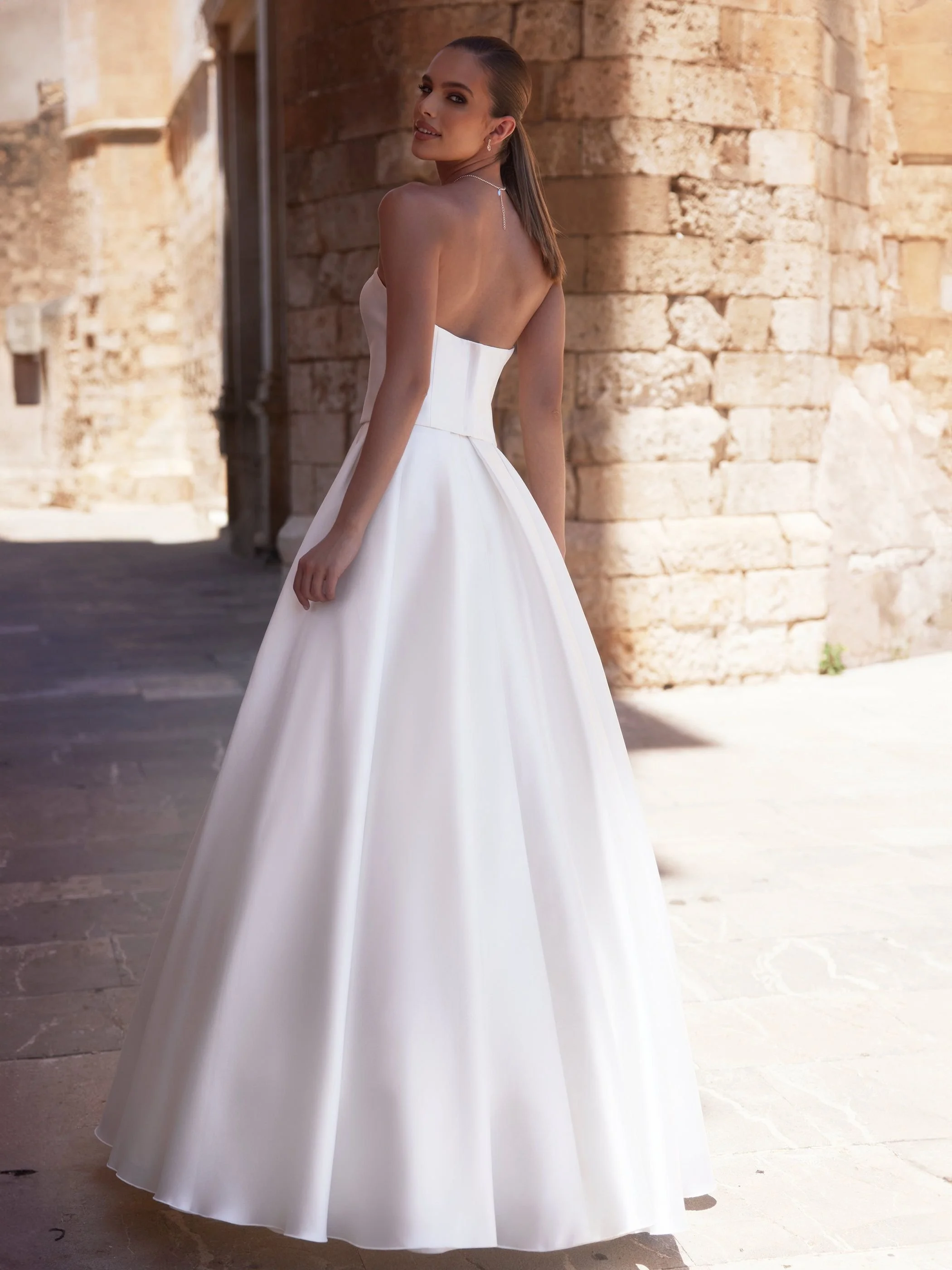 luxurious Mikado satin, this beautifully structured floor-length skirt
