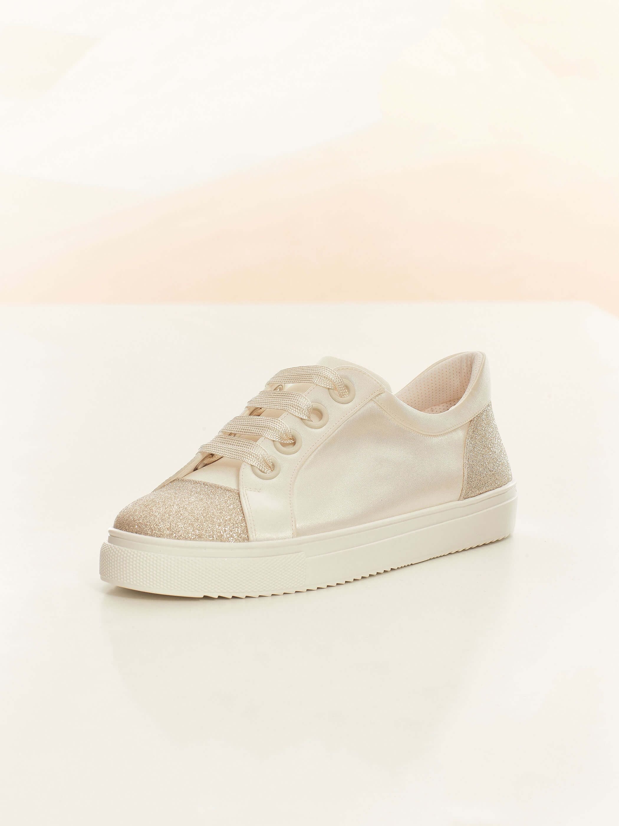 Robin side view. Ivory with shimmer panel bridal sneaker