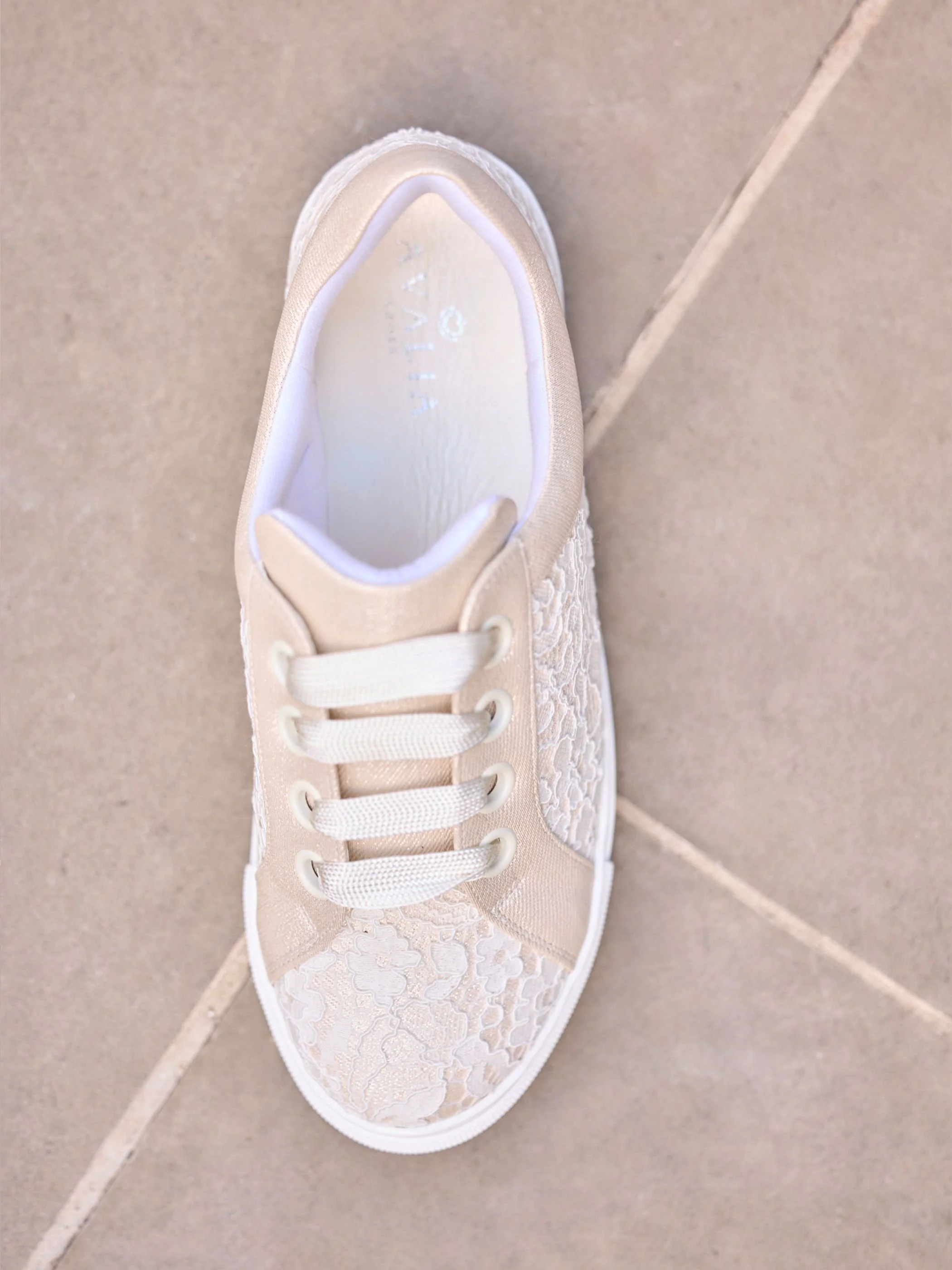 Pako birds eye. Ivory and gold bridal sneaker with lace detail