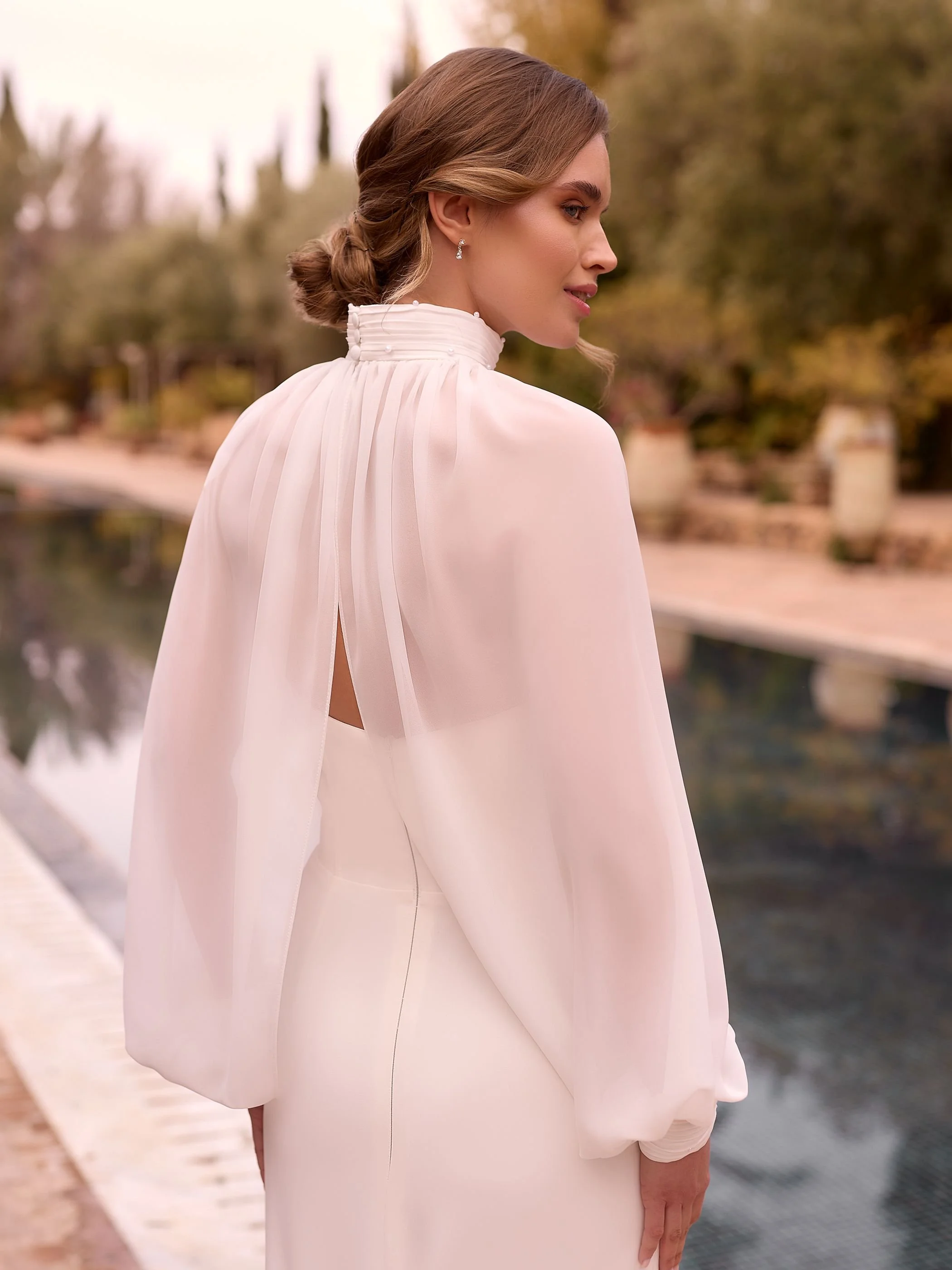 CELESTE Pearl Cape detachable sleeve back view showing buttons