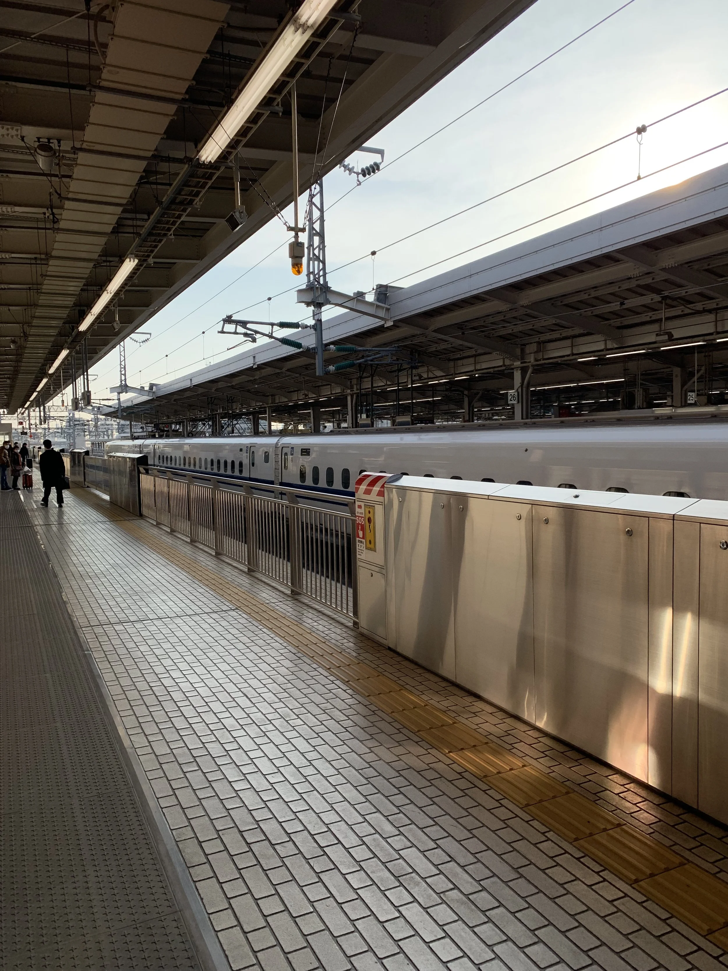 A phot of a Shinkansen Bullet Train at a Japanese Train Station