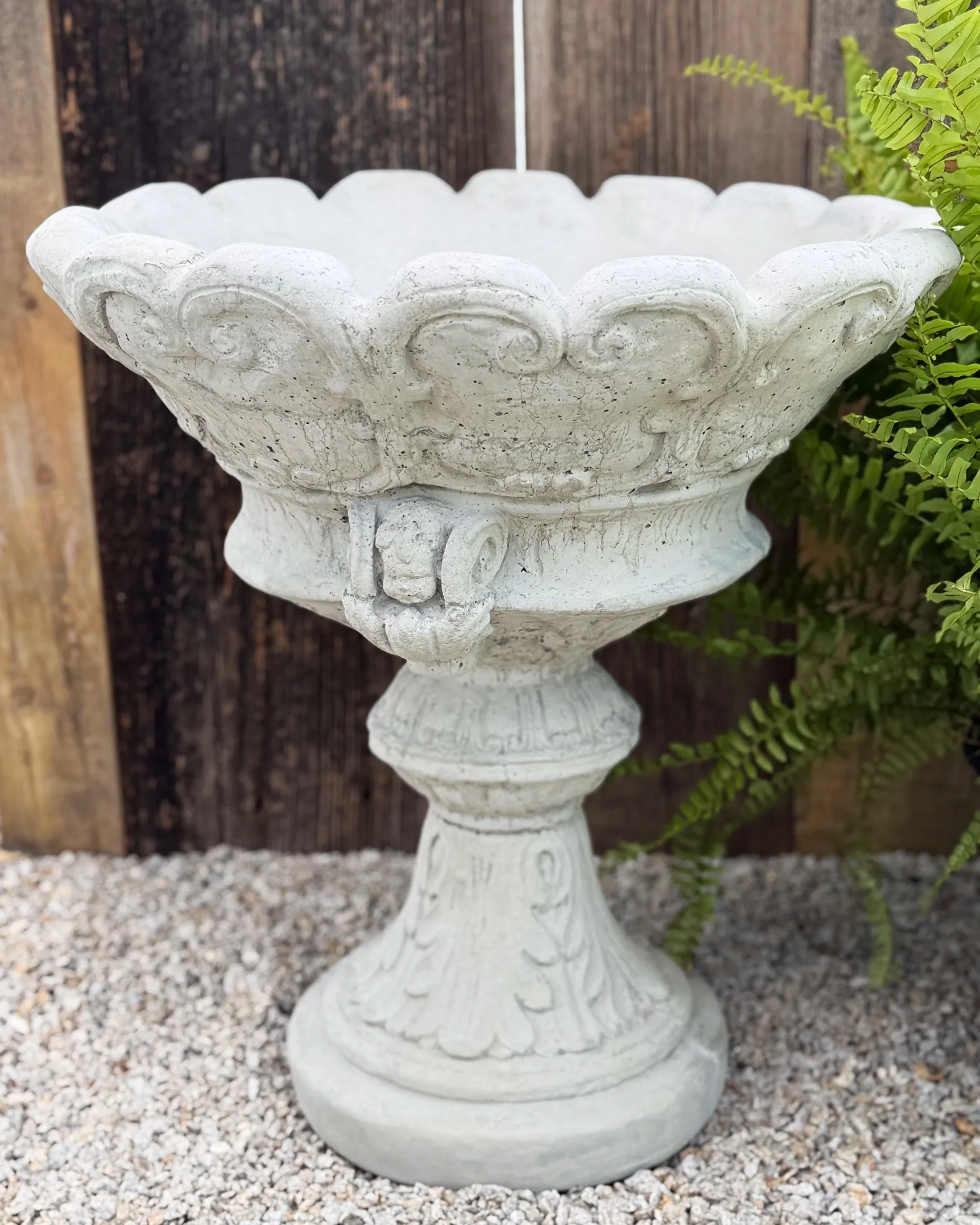 cherub face pedestal planter