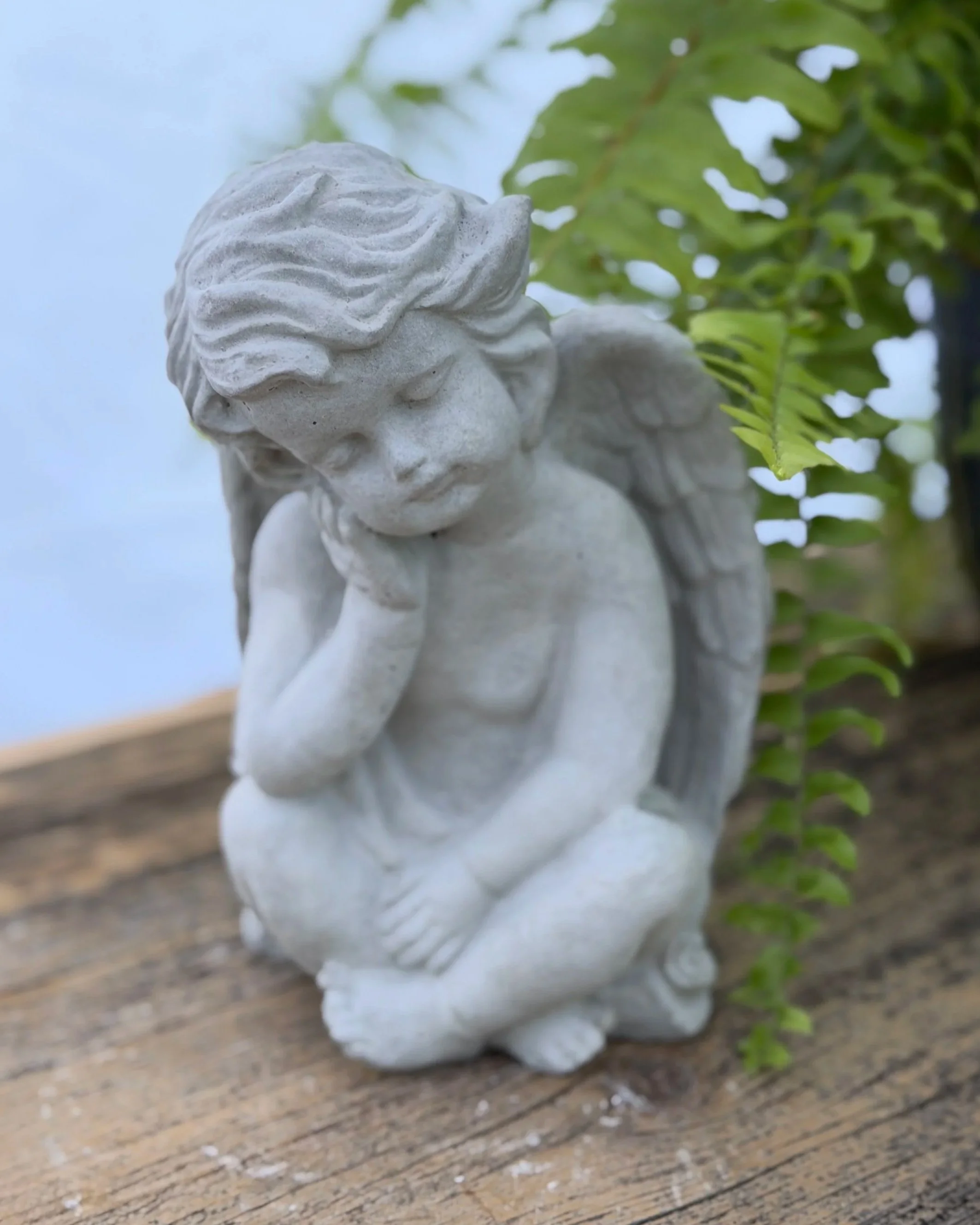 small sitting angel