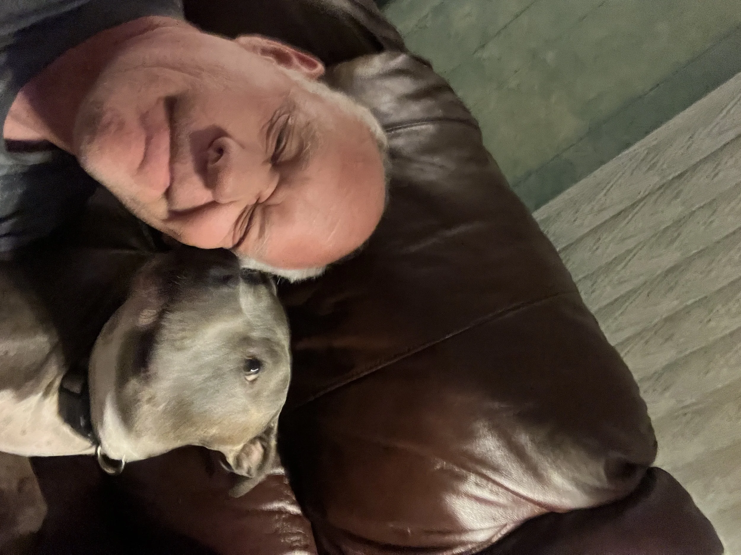 Richard and his dog Nicky on the couch