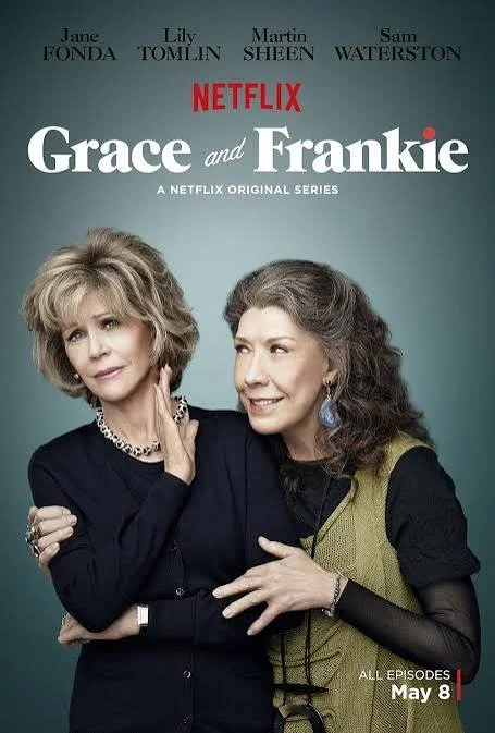 Poster for the Netflix series 'Grace and Frankie' featuring Jane Fonda and Lily Tomlin, with text indicating the release date of May 8.